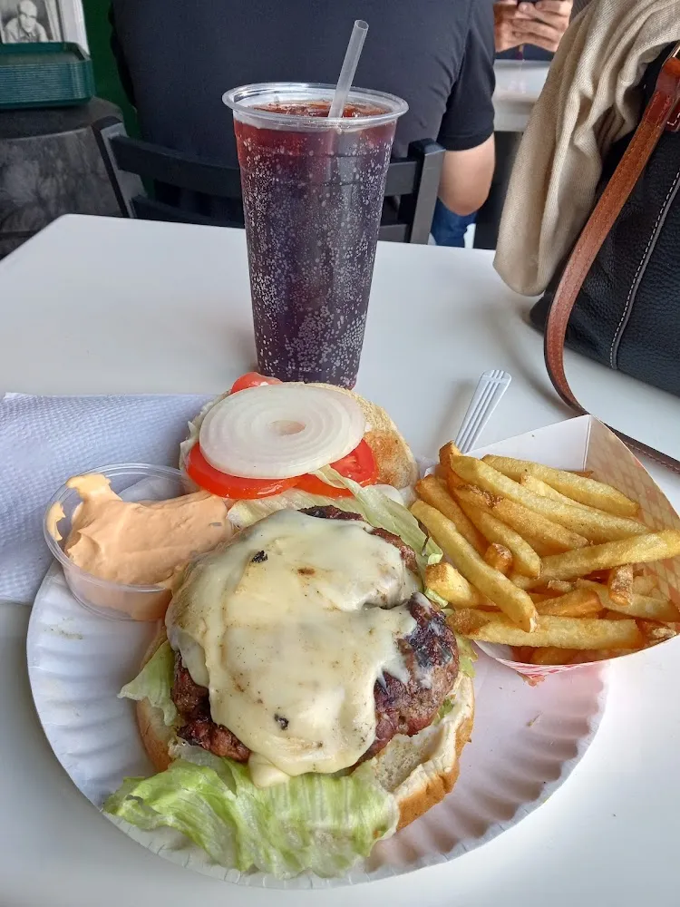 Epical 1 2lb Cheese Burger Fresh Cut Fries with a Side of Their Special Sauce and Real Cherry Coke